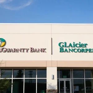 A modern bank sign showing Guaranty Bank & Trust and Glacier Bancorp merger.