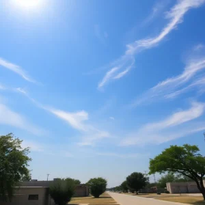 A hot and sunny Dallas-Fort Worth landscape with clear skies.
