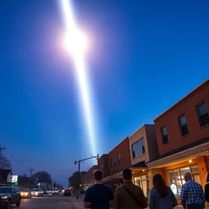 A bright beam of light coming from an unidentified flying object in Dallas sky.