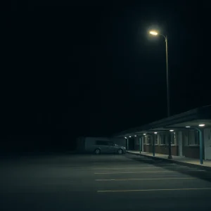 Motel parking lot in downtown Dallas at night