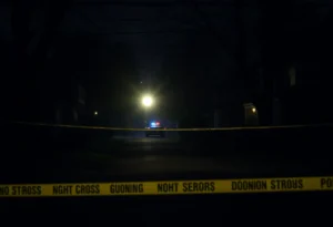Police lights in a residential area after a shooting incident