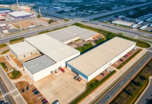 Aerial view of two industrial properties highlighting warehouse space and outdoor storage.