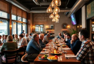 Interior view of Meridian restaurant showing community dining atmosphere with live-fire cooking.