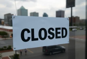 Closed sign on a storefront window in Dallas, Texas