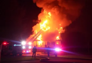 Firefighters battling a house fire in Dallas neighborhood